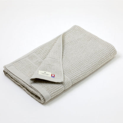 A towel that dries quickly Bath towel